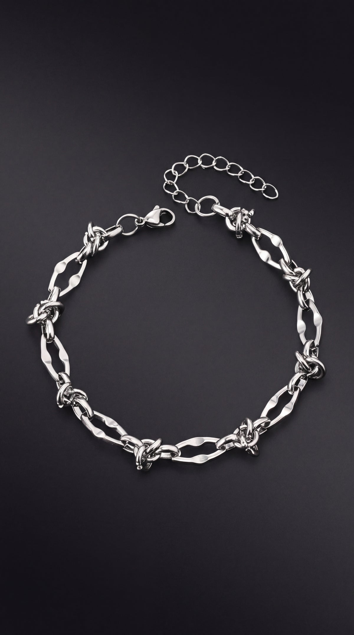 ZYRO Musubi knot bracelet in stainless steel, silver tone