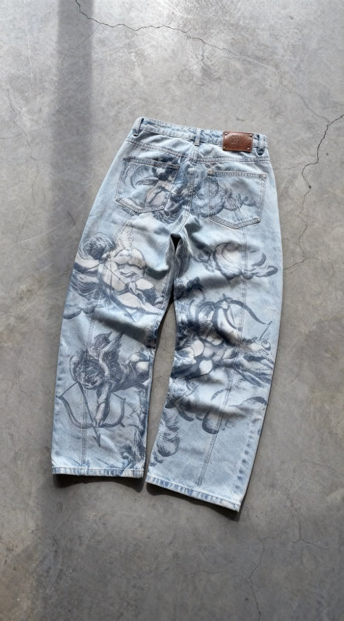 ZYRO Colossal Angel baggy jeans with an oversized angel graphic down the leg